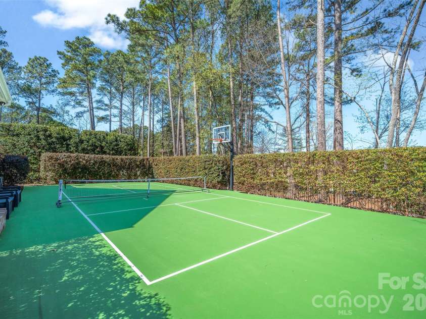 141 Stonewall Beach Lane, Mooresville, NC 28117.  MLS# CAR4356784, YatesRealty ID 22969. Private Pickleball/basketball court