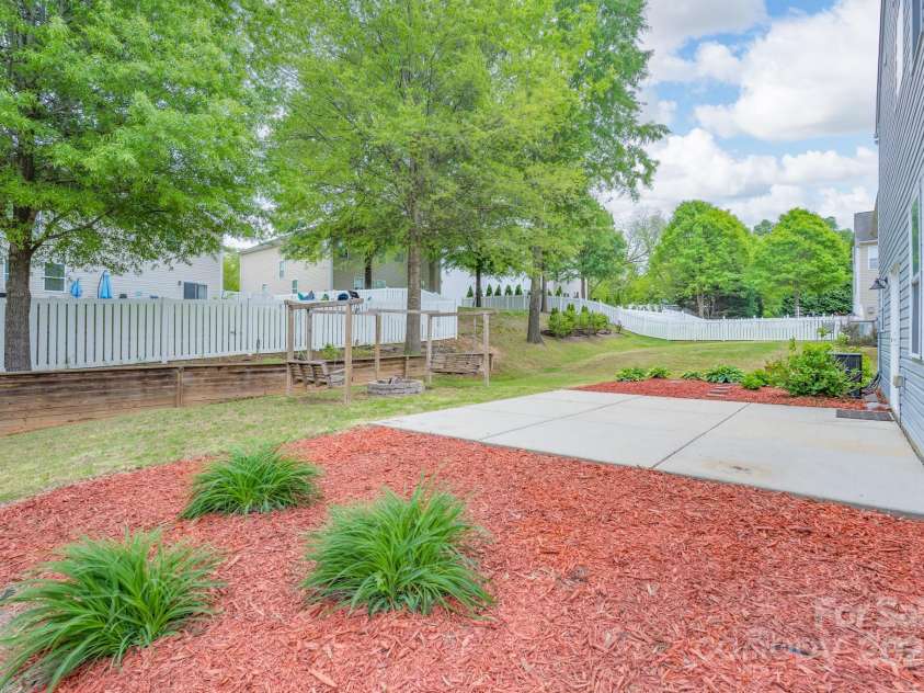 1144 Spicewood Pines Road, Fort Mill, SC 29708.  MLS# CAR4246167, YatesRealty ID 22970. Back yard