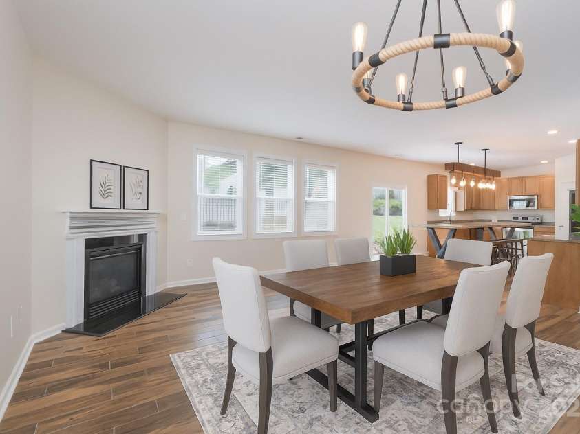 1144 Spicewood Pines Road, Fort Mill, SC 29708.  MLS# CAR4246167, YatesRealty ID 22970. Dining room virtually staged