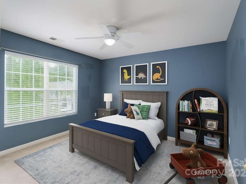 1144 Spicewood Pines Road, Fort Mill, SC 29708.  MLS# CAR4246167, YatesRealty ID 22970. Guest bedroom 1 upstairs virtually staged