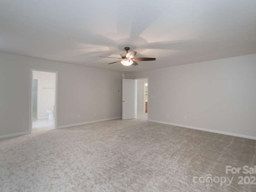 1144 Spicewood Pines Road, Fort Mill, SC 29708.  MLS# CAR4246167, YatesRealty ID 22970. Primary bedroom upstairs