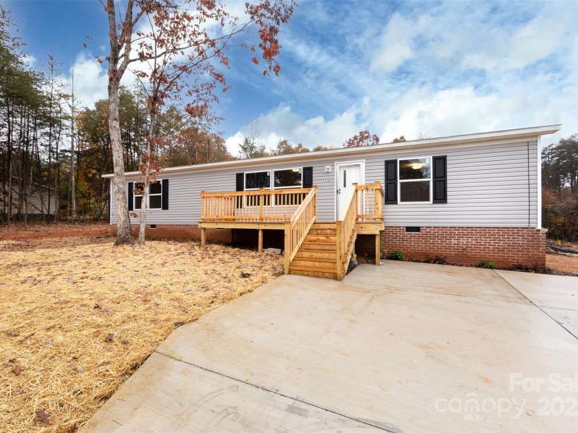 716 Sharon Lane, Iron Station, NC 28080.  MLS# CAR4273839, YatesRealty ID 22974. 