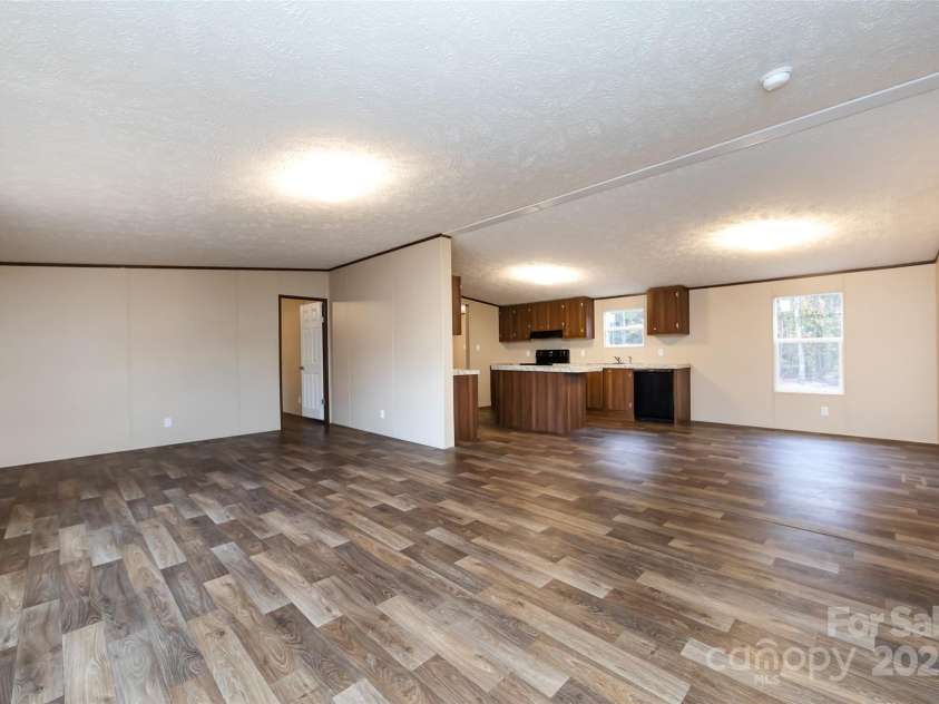 716 Sharon Lane, Iron Station, NC 28080.  MLS# CAR4273839, YatesRealty ID 22974. 