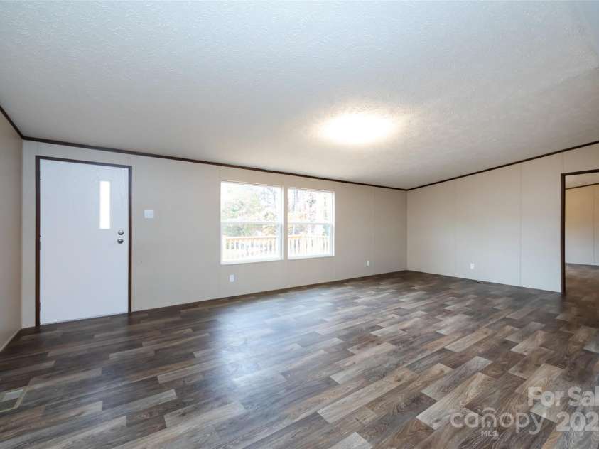 716 Sharon Lane, Iron Station, NC 28080.  MLS# CAR4273839, YatesRealty ID 22974. 