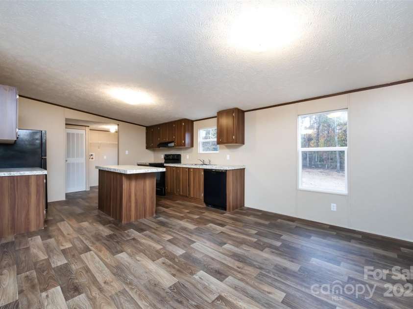 716 Sharon Lane, Iron Station, NC 28080.  MLS# CAR4273839, YatesRealty ID 22974. 