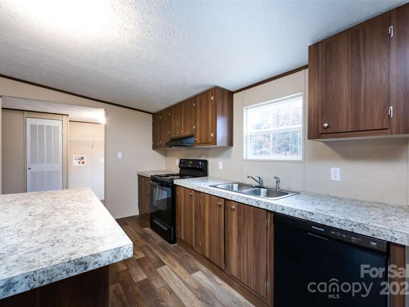 716 Sharon Lane, Iron Station, NC 28080.  MLS# CAR4273839, YatesRealty ID 22974. 