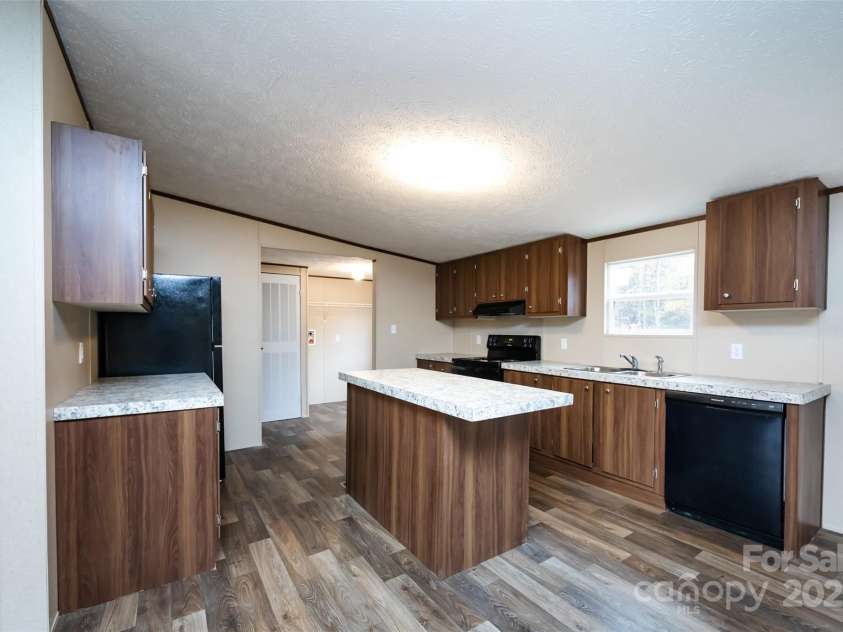 716 Sharon Lane, Iron Station, NC 28080.  MLS# CAR4273839, YatesRealty ID 22974. 