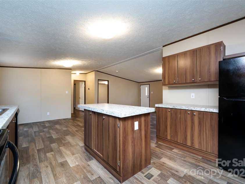 716 Sharon Lane, Iron Station, NC 28080.  MLS# CAR4273839, YatesRealty ID 22974. 