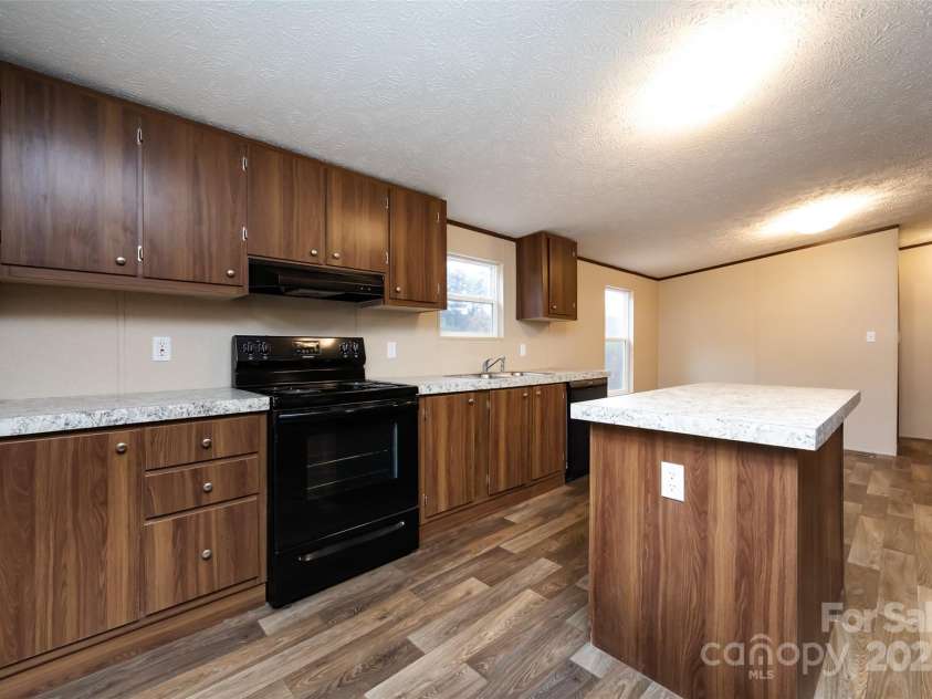 716 Sharon Lane, Iron Station, NC 28080.  MLS# CAR4273839, YatesRealty ID 22974. 