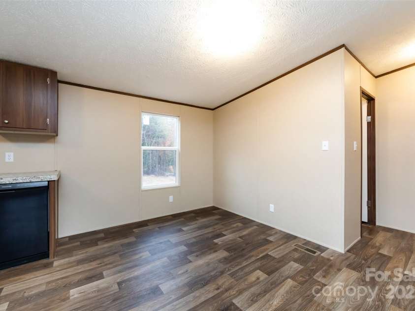 716 Sharon Lane, Iron Station, NC 28080.  MLS# CAR4273839, YatesRealty ID 22974. 