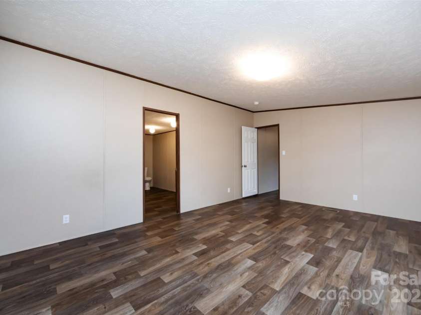 716 Sharon Lane, Iron Station, NC 28080.  MLS# CAR4273839, YatesRealty ID 22974. 