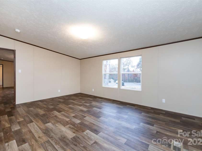 716 Sharon Lane, Iron Station, NC 28080.  MLS# CAR4273839, YatesRealty ID 22974. 