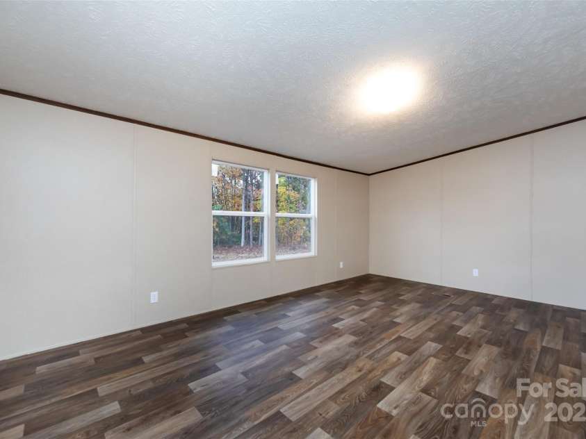 716 Sharon Lane, Iron Station, NC 28080.  MLS# CAR4273839, YatesRealty ID 22974. 