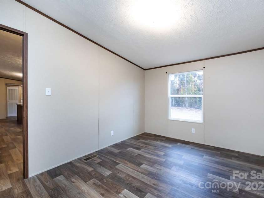 716 Sharon Lane, Iron Station, NC 28080.  MLS# CAR4273839, YatesRealty ID 22974. 