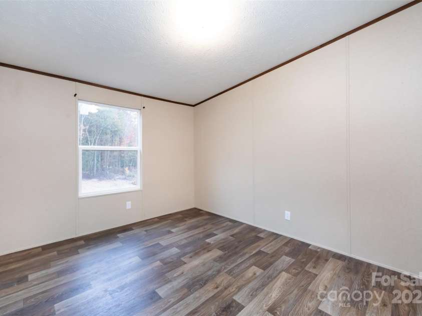 716 Sharon Lane, Iron Station, NC 28080.  MLS# CAR4273839, YatesRealty ID 22974. 