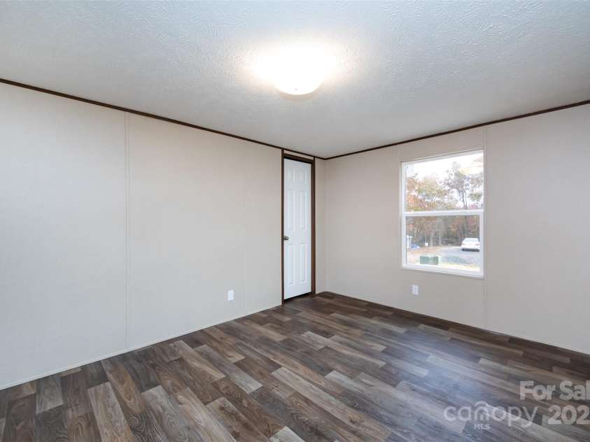 716 Sharon Lane, Iron Station, NC 28080.  MLS# CAR4273839, YatesRealty ID 22974. 