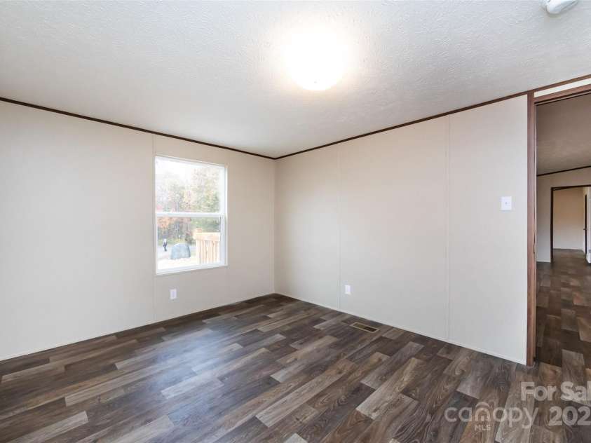 716 Sharon Lane, Iron Station, NC 28080.  MLS# CAR4273839, YatesRealty ID 22974. 