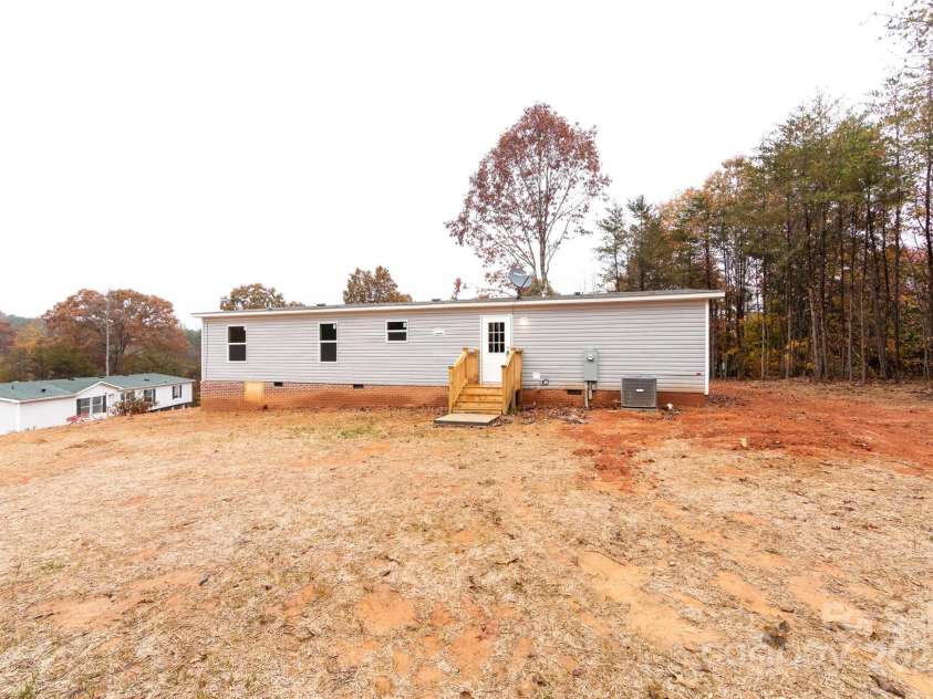 716 Sharon Lane, Iron Station, NC 28080.  MLS# CAR4273839, YatesRealty ID 22974. 