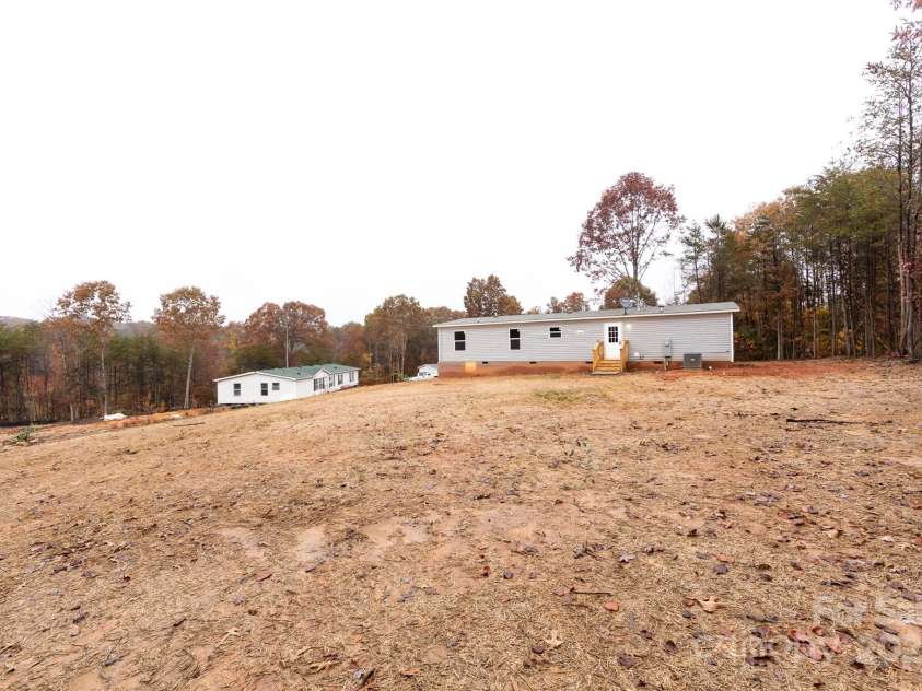 716 Sharon Lane, Iron Station, NC 28080.  MLS# CAR4273839, YatesRealty ID 22974. 