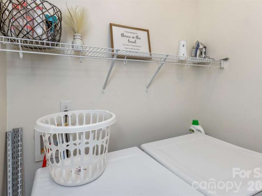 84 Rose Creek Road, Leicester, NC 28748.  MLS# CAR4377582, YatesRealty ID 22978. Laundry
