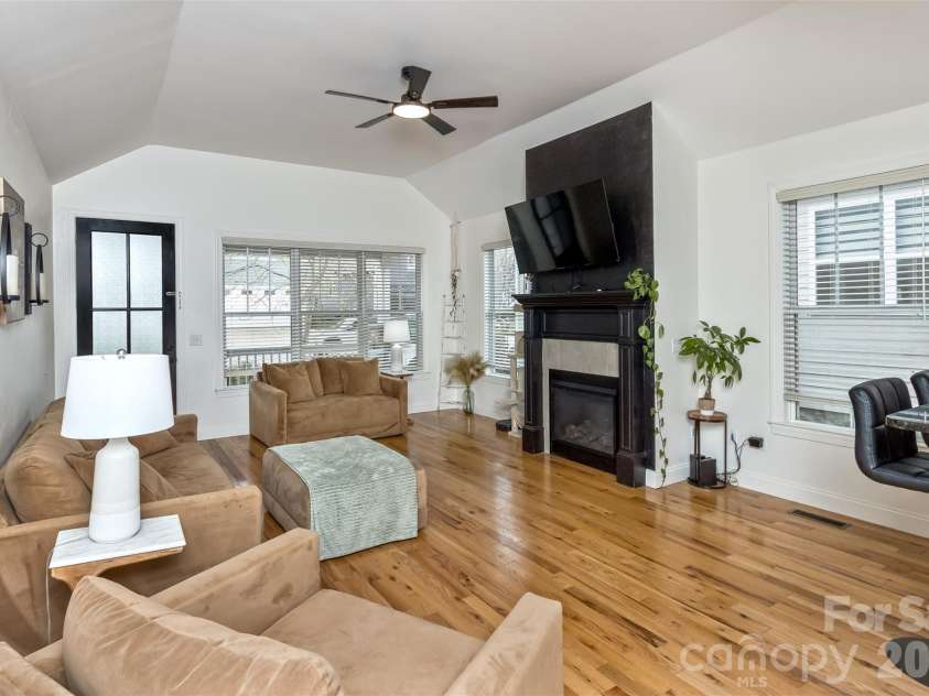 84 Rose Creek Road, Leicester, NC 28748.  MLS# CAR4377582, YatesRealty ID 22978. Living room Fireplace