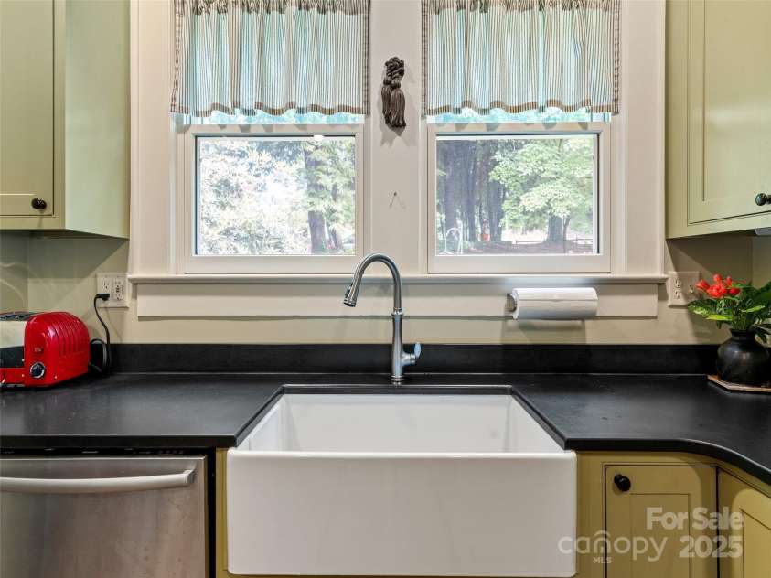 18 Hill Street, Saluda, NC 28773.  MLS# CAR4271722, YatesRealty ID 22979. Beautiful view of the grounds from the kitchen window.