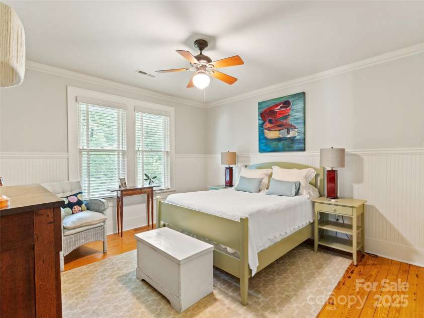 18 Hill Street, Saluda, NC 28773.  MLS# CAR4271722, YatesRealty ID 22979. The center bedroom on the upper level.