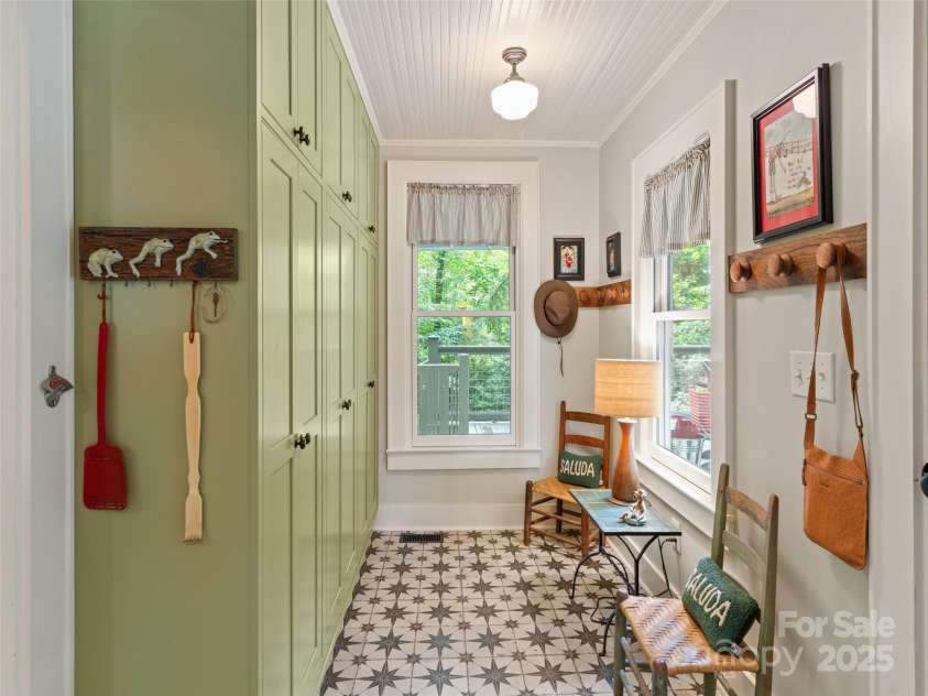 18 Hill Street, Saluda, NC 28773.  MLS# CAR4271722, YatesRealty ID 22979. This space serves as a pantry, breakfast room or mudroom.