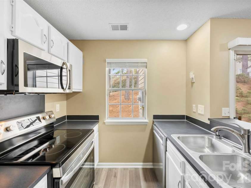 3105 Summercroft Lane, Charlotte, NC 28269.  MLS# CAR4350537, YatesRealty ID 22979. Kitchen - All new SS appliances
