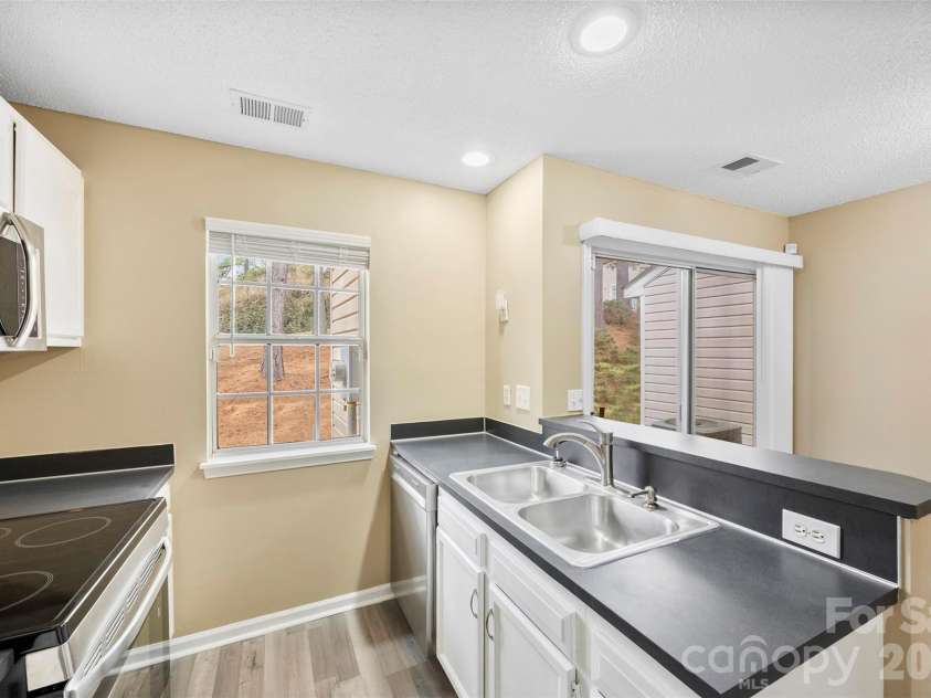 3105 Summercroft Lane, Charlotte, NC 28269.  MLS# CAR4350537, YatesRealty ID 22979. Kitchen - All new SS appliances
