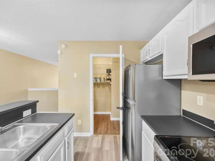 3105 Summercroft Lane, Charlotte, NC 28269.  MLS# CAR4350537, YatesRealty ID 22979. Kitchen - All new SS appliances