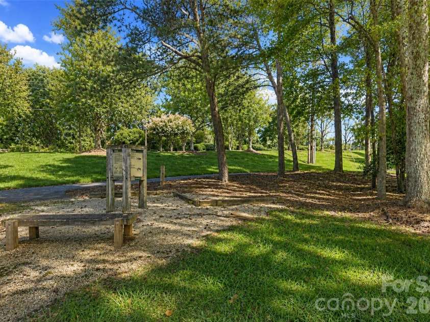 702 Southwest Drive, Davidson, NC 28036.  MLS# CAR4378717, YatesRealty ID 22982. Neighborhood walking trails