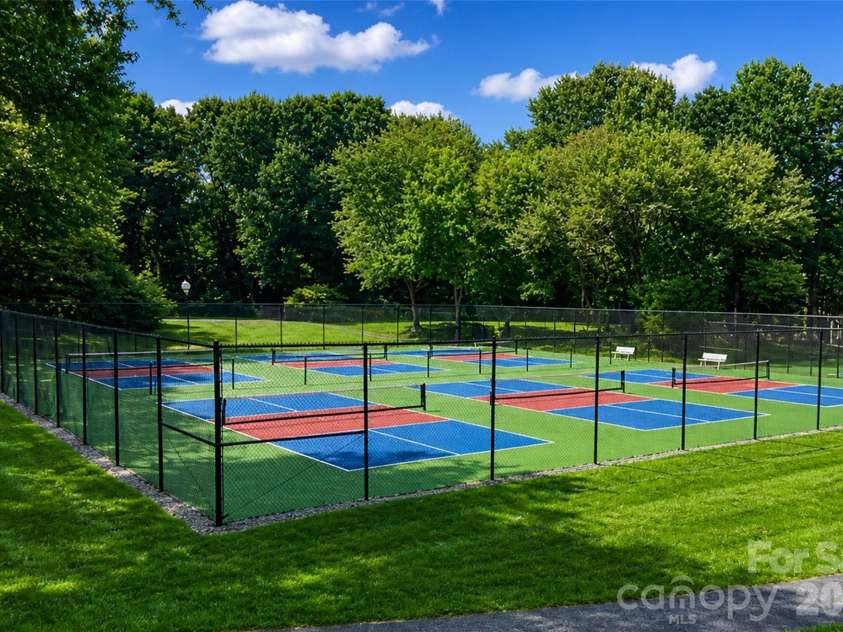 702 Southwest Drive, Davidson, NC 28036.  MLS# CAR4378717, YatesRealty ID 22982. Pickleball and tennis courts just steps away