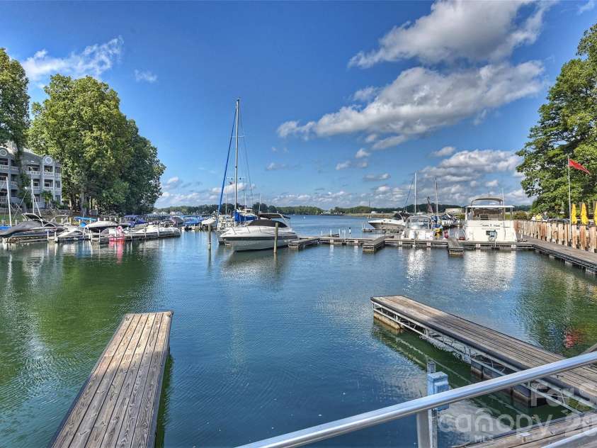 702 Southwest Drive, Davidson, NC 28036.  MLS# CAR4378717, YatesRealty ID 22982. Waterfront dining boat slips