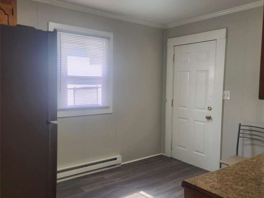 703/705 Smith Street, Kannapolis, NC 28083.  MLS# CAR4275773, YatesRealty ID 22983. Back door exits to ground level without stairs