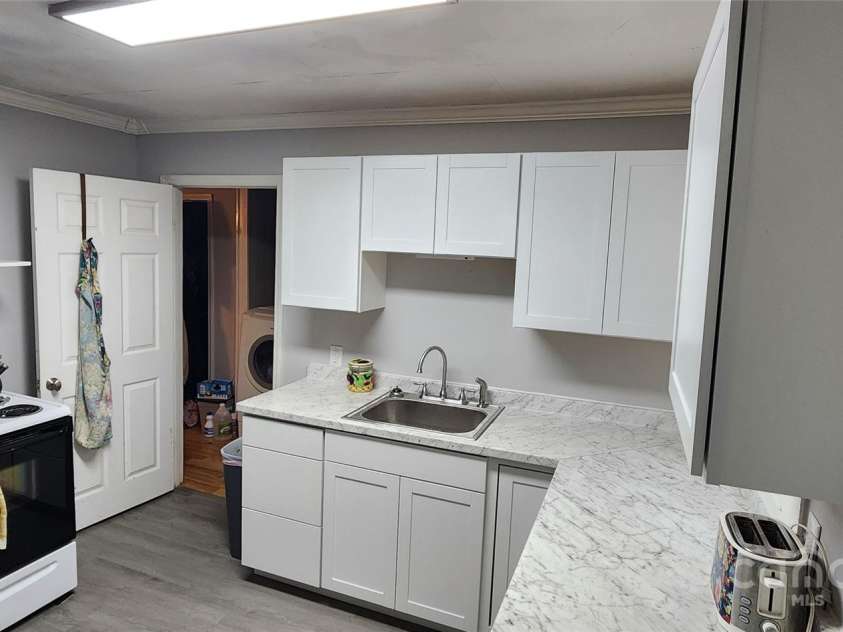 703/705 Smith Street, Kannapolis, NC 28083.  MLS# CAR4275773, YatesRealty ID 22983. New lighting in both sides.