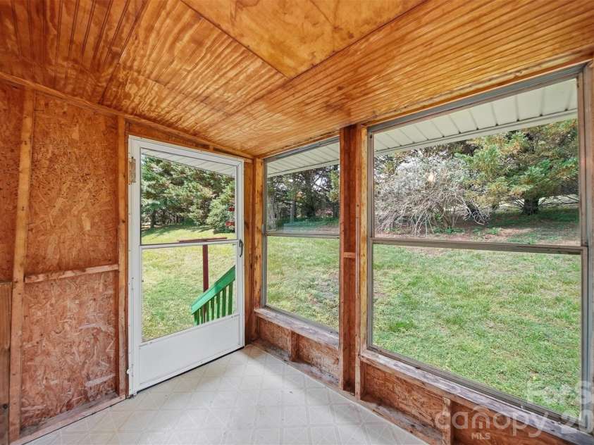 1488 Watermill Road, Morganton, NC 28655.  MLS# CAR4379611, YatesRealty ID 22988. Enclosed back porch.
