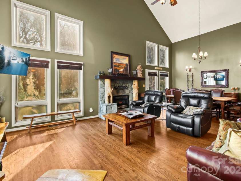 190 Briarcliff Road, Blowing Rock, NC 28605.  MLS# CAR4234277, YatesRealty ID 2299. Living Room showcasing fireplace and dining area