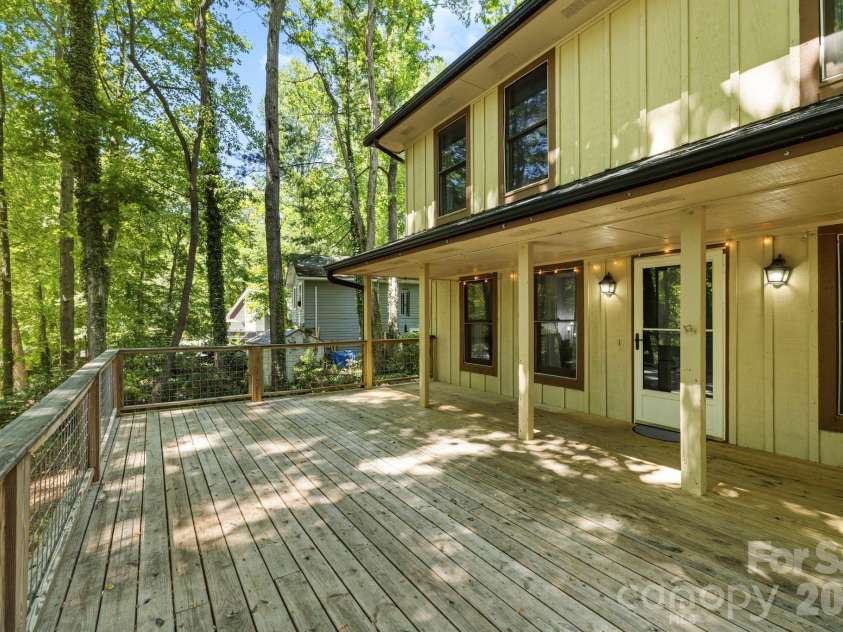 1 Eastway Court, Fletcher, NC 28732.  MLS# CAR4377103, YatesRealty ID 22990. Large Front Deck