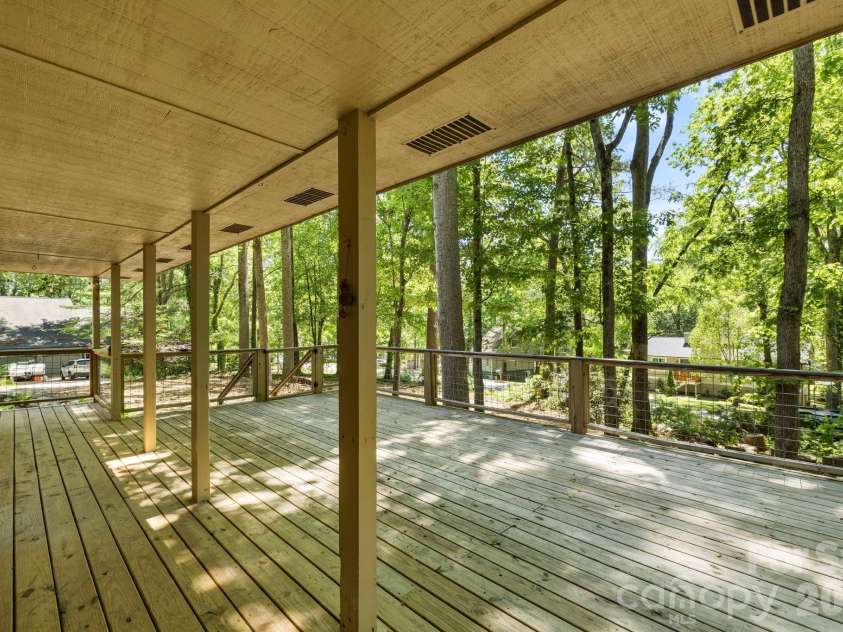 1 Eastway Court, Fletcher, NC 28732.  MLS# CAR4377103, YatesRealty ID 22990. Large Front Deck