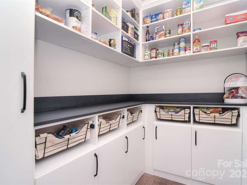 2014 Burton Point Court, Waxhaw, NC 28173.  MLS# CAR4248200, YatesRealty ID 22990. Custom Pantry