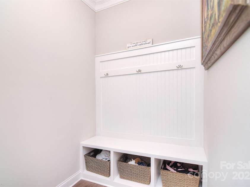 2014 Burton Point Court, Waxhaw, NC 28173.  MLS# CAR4248200, YatesRealty ID 22990. Downstairs Drop area by Garage