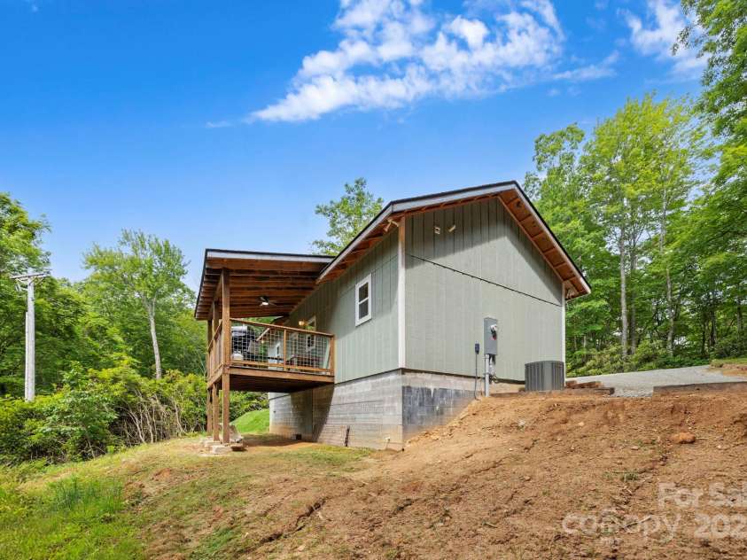 185 Little Elbow Mountain Road, Lake Toxaway, NC 28747.  MLS# CAR4265070, YatesRealty ID 22994. Back of house
