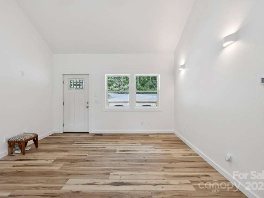 185 Little Elbow Mountain Road, Lake Toxaway, NC 28747.  MLS# CAR4265070, YatesRealty ID 22994. Front door