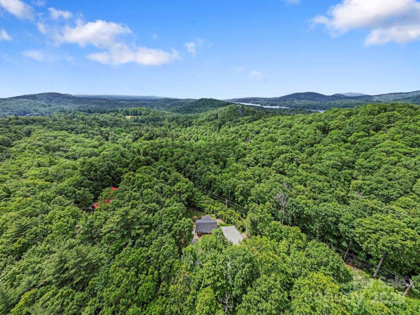185 Little Elbow Mountain Road, Lake Toxaway, NC 28747.  MLS# CAR4265070, YatesRealty ID 22994. Tucked away in the mountains