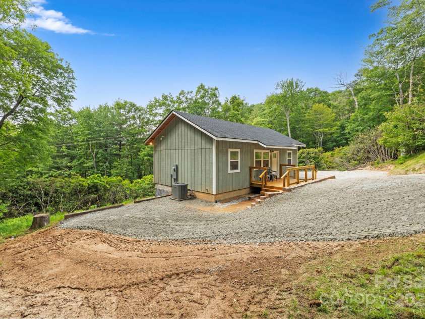 185 Little Elbow Mountain Road, Lake Toxaway, NC 28747.  MLS# CAR4265070, YatesRealty ID 22994. View of home as you approach