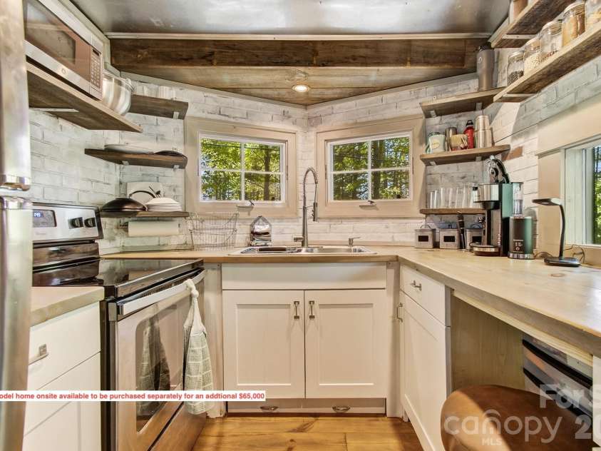 20 Reed Road, Asheville, NC 28805.  MLS# CAR4380460, YatesRealty ID 22995. 
