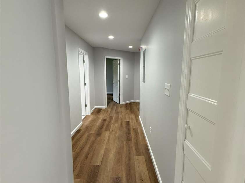 137 Hardin Road, Forest City, NC 28043.  MLS# CAR4264379, YatesRealty ID 22997. Hallway to bathroom and bedroom 2 and 3