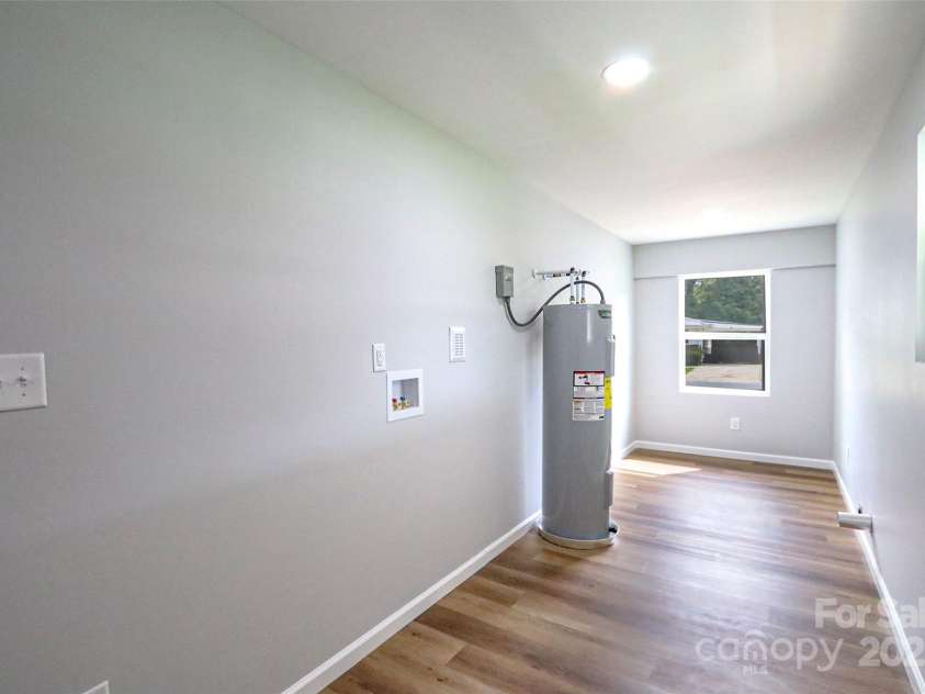 137 Hardin Road, Forest City, NC 28043.  MLS# CAR4264379, YatesRealty ID 22997. Laundry Area off kitchen