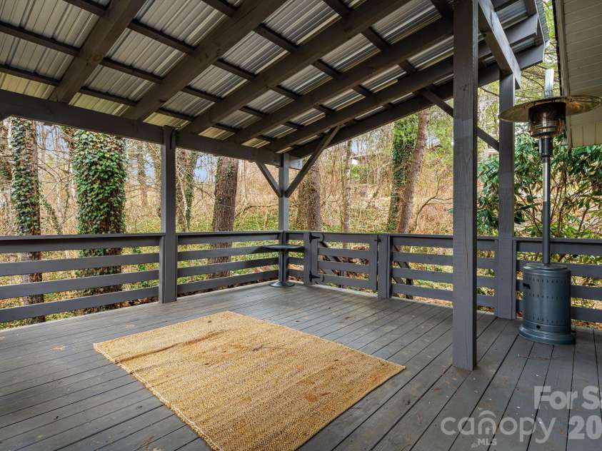 61 White Dogwood Lane, Lake Junaluska, NC 28745.  MLS# CAR4344094, YatesRealty ID 22998. Deck off kitchen, dining area